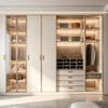 Full‑wall Custom Walk‑in Wardrobe With Glass Display Unit